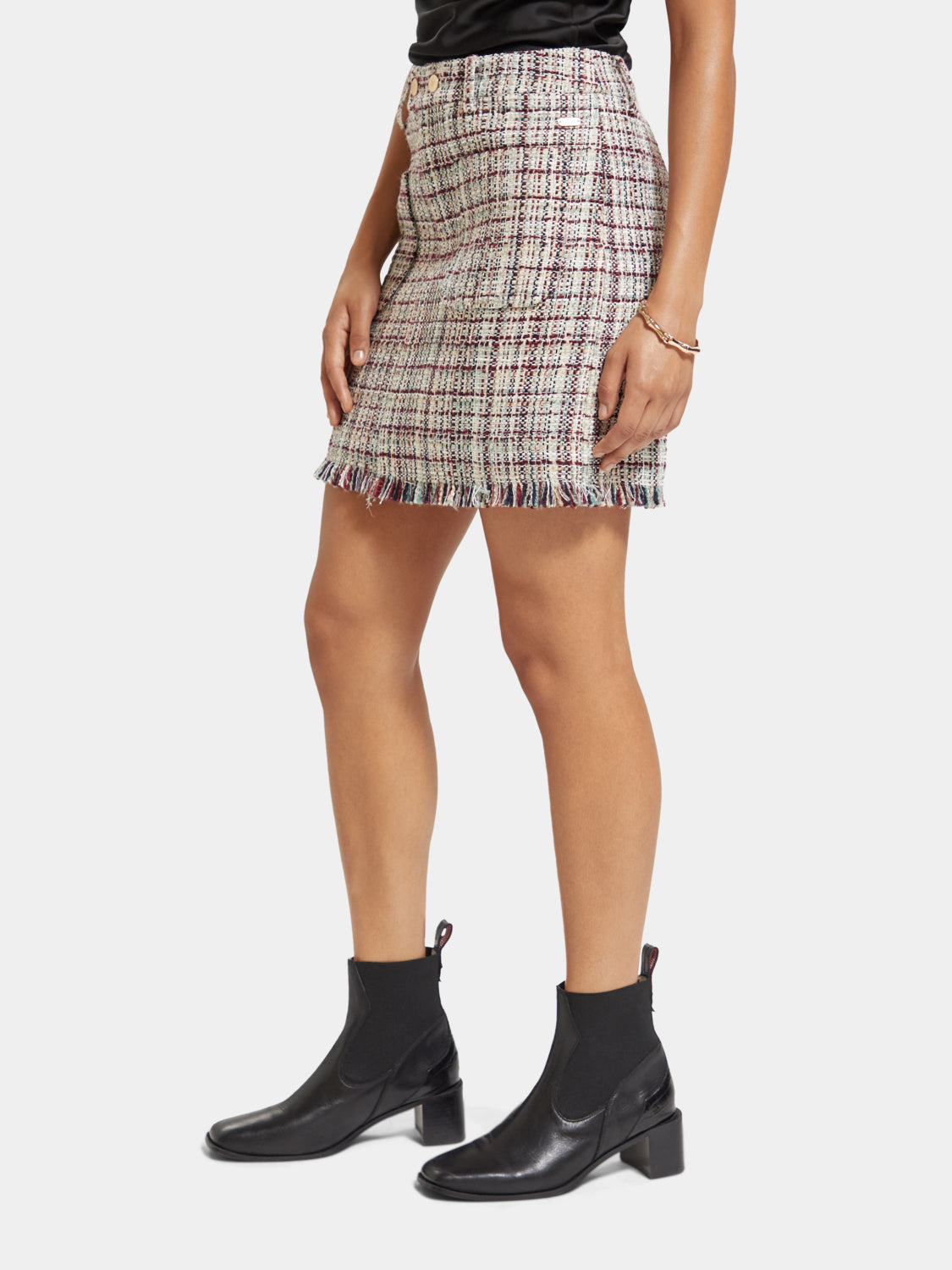 SCOTCH & SODA boucle tweed mini skirt with a textured pattern, high waist, and classic tailored design.