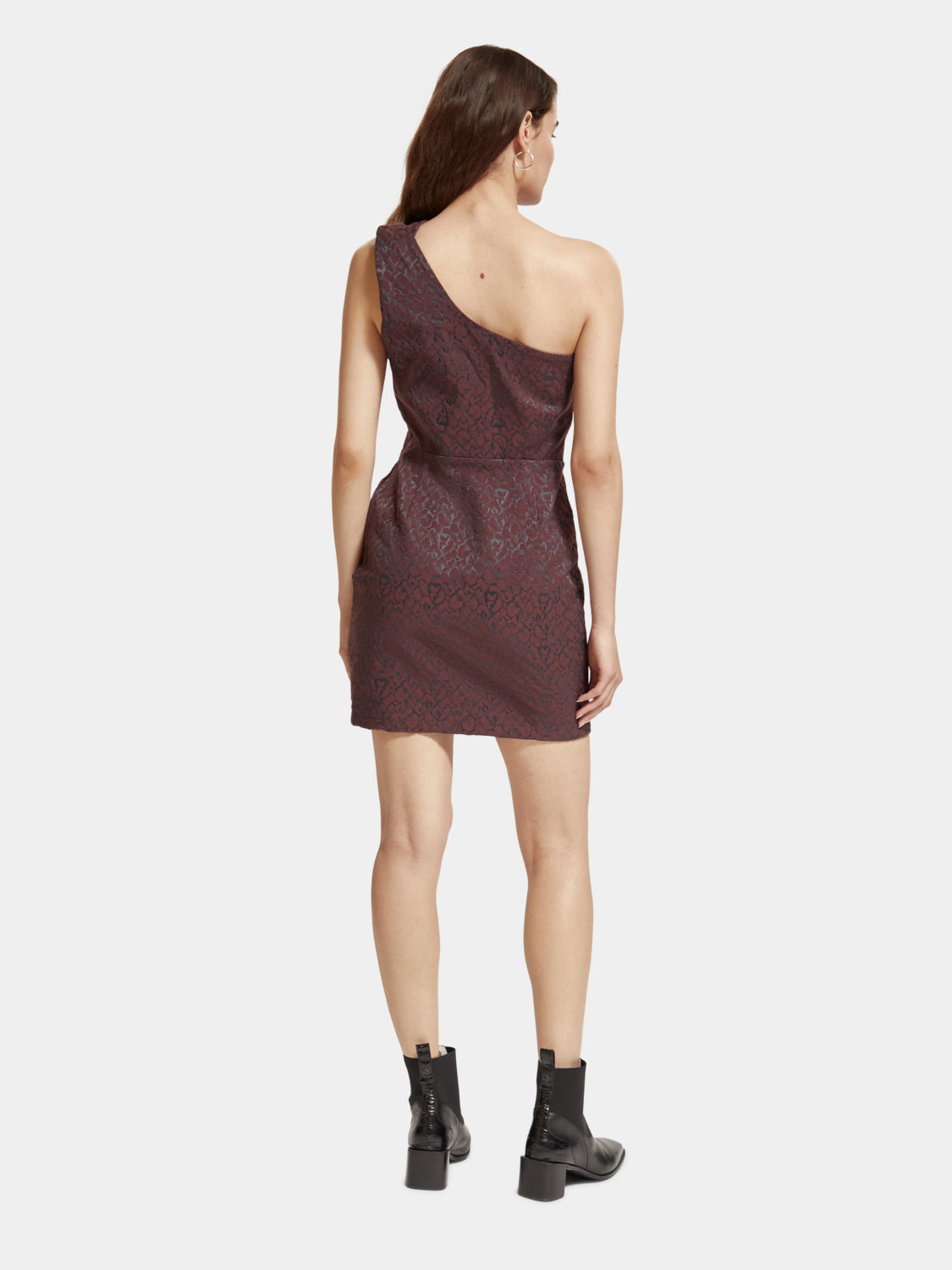 SCOTCH & SODA one shoulder mini dress in lightweight fabric, showcased from the back view.