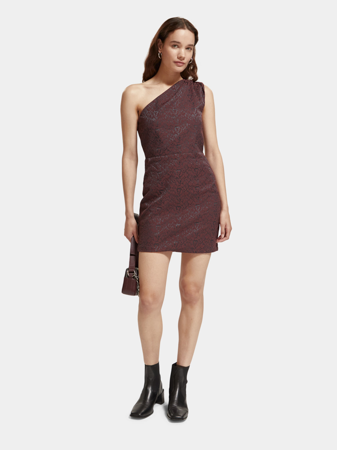 SCOTCH & SODA one-shoulder mini dress featuring a fitted silhouette and stylish design, perfect for casual or evening wear.