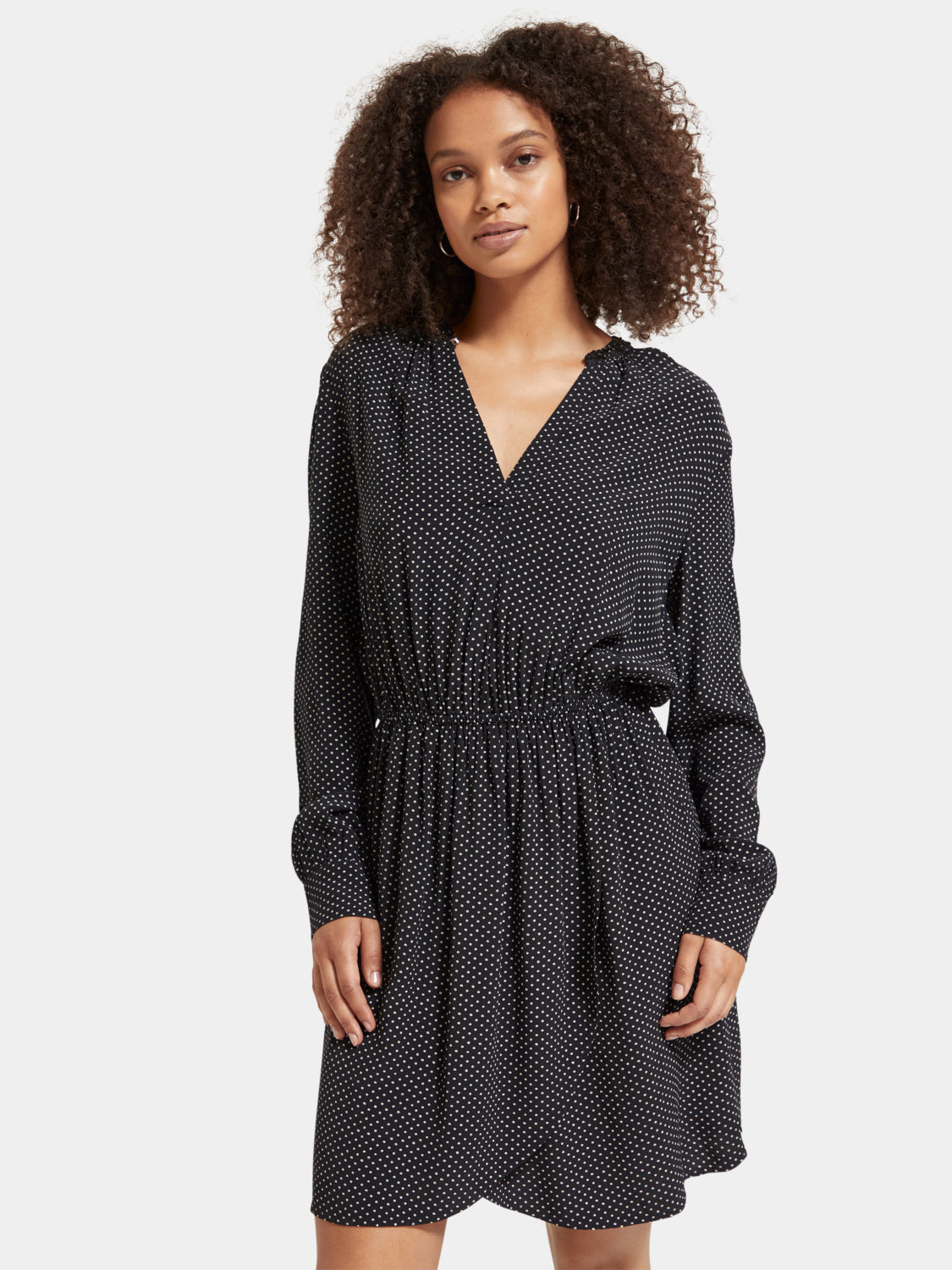Printed mini dress from Scotch & Soda featuring vibrant patterns and a stylish fit, perfect for casual or semi-formal occasions.
