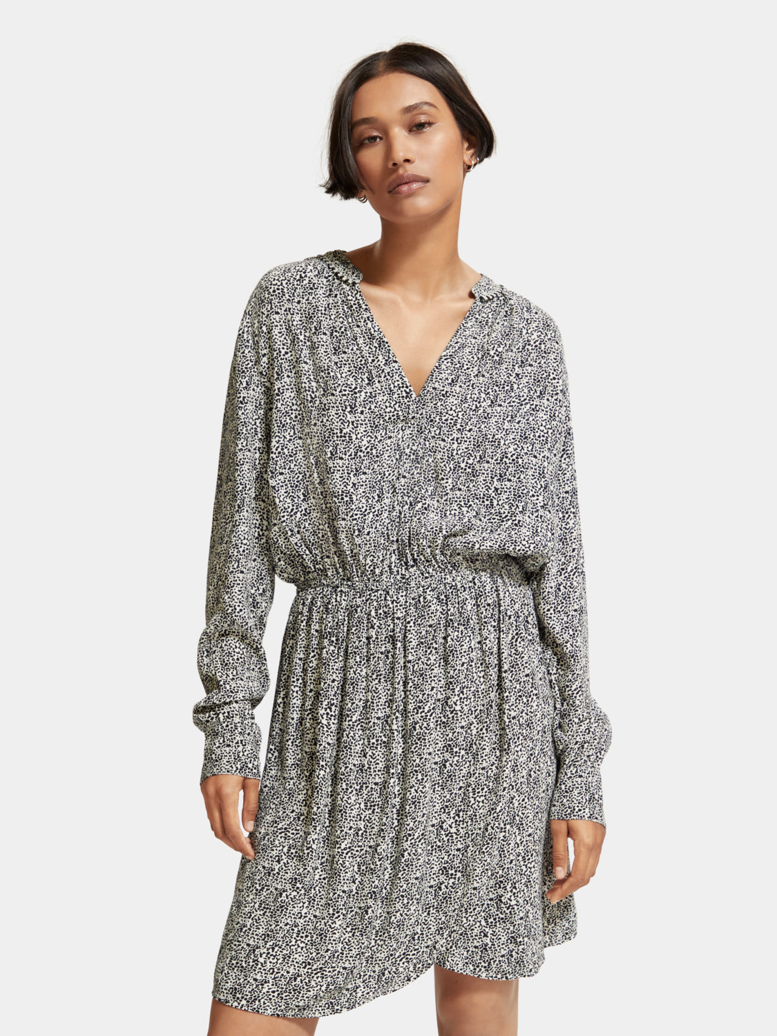 Printed mini dress from Scotch & Soda featuring vibrant floral patterns and a fitted silhouette, perfect for casual or summer wear.