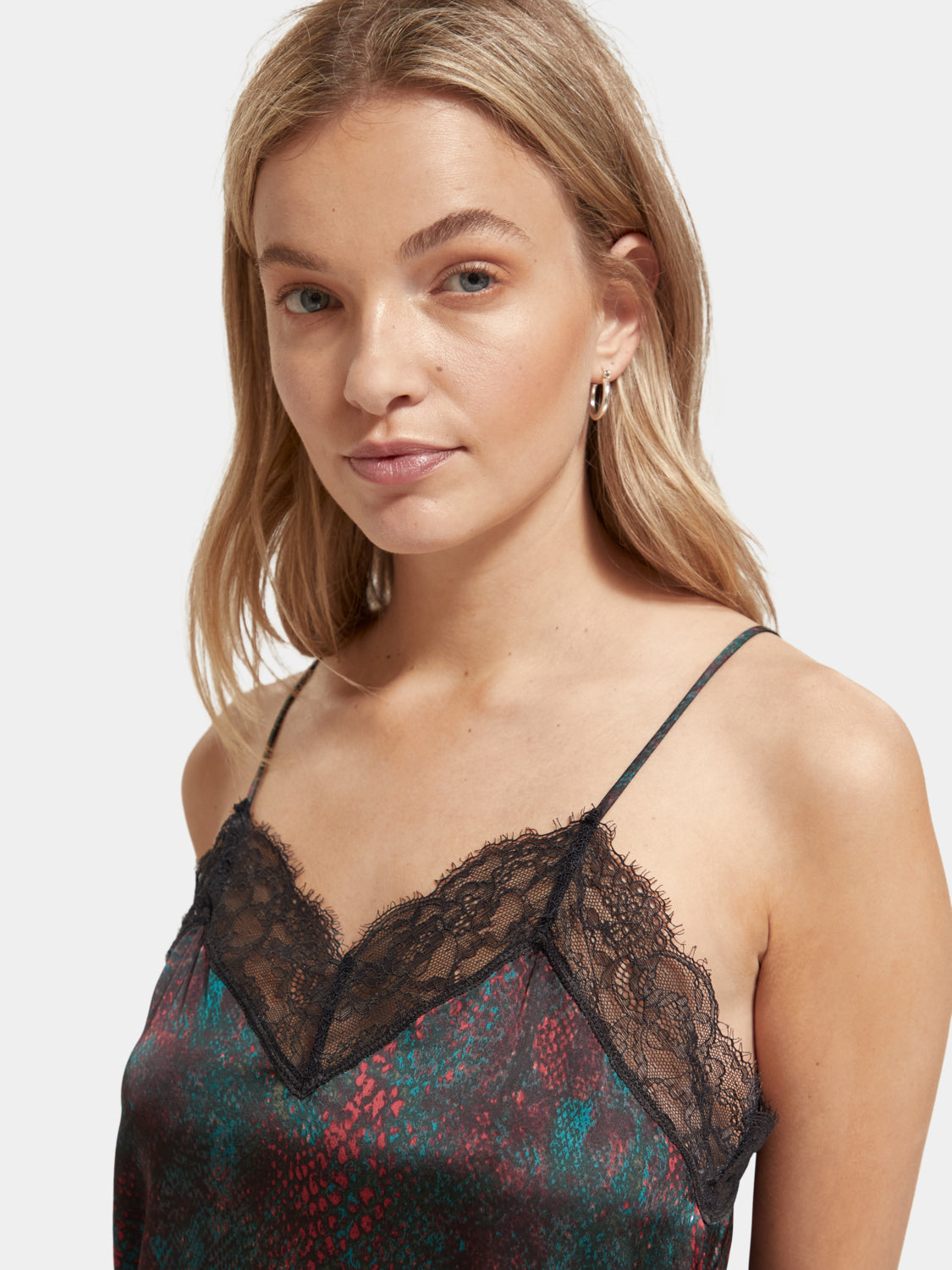 Scotch & Soda tank top camisole with delicate lace trim, soft fabric, and sleeveless design for a stylish, feminine look.
