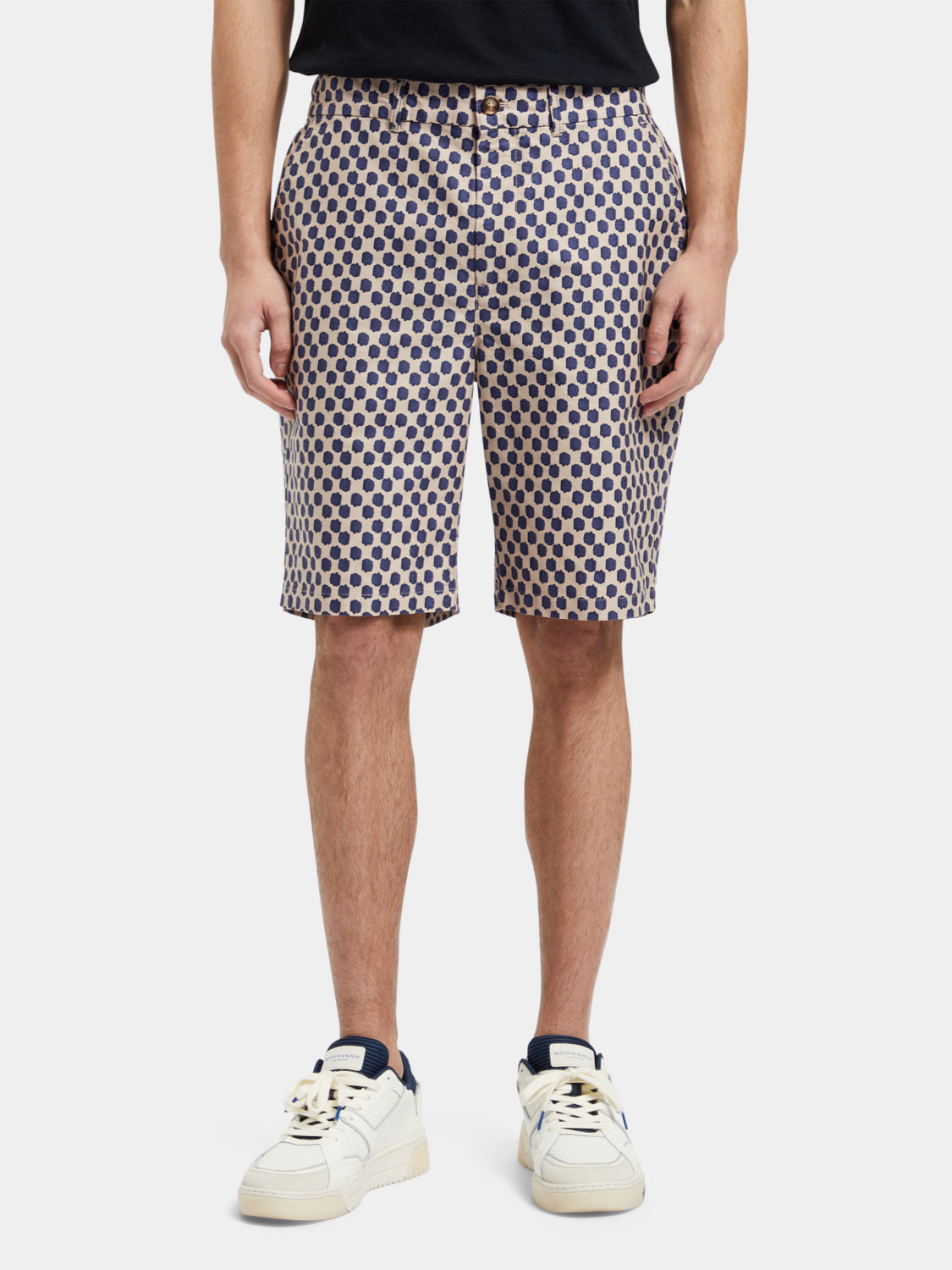 Drift printed shorts by Scotch & Soda featuring a colorful pattern and casual fit, shown on a model.