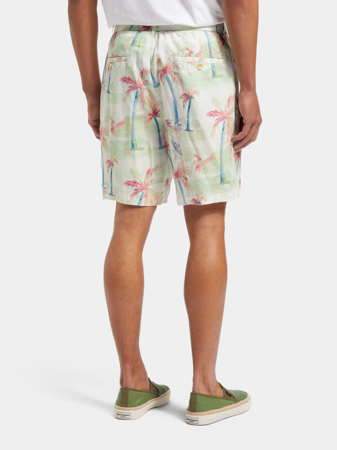 SCOTCH & SODA Twilt printed pleated shorts featuring colorful patterns and a tailored fit, shown from the back view.