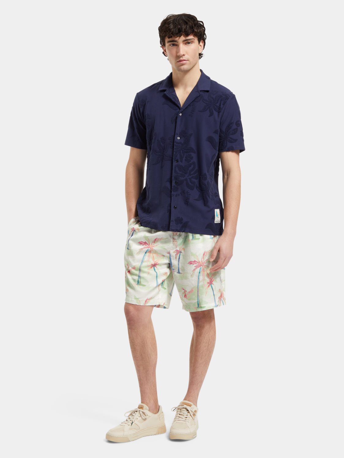 Scotch & Soda Twilt printed pleated shorts with colorful geometric patterns and a high-waisted design.