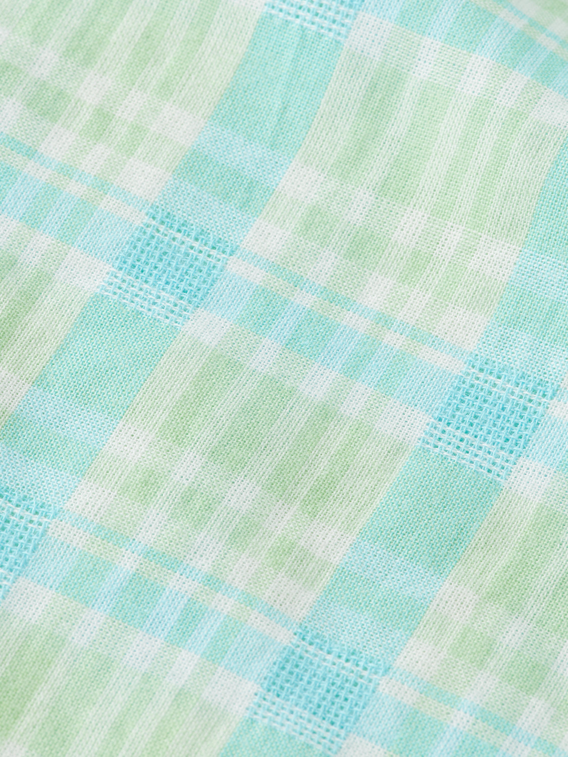 Long sleeve neon check shirt by Scotch & Soda, featuring bold pattern and vibrant colors, displayed on a hanger.