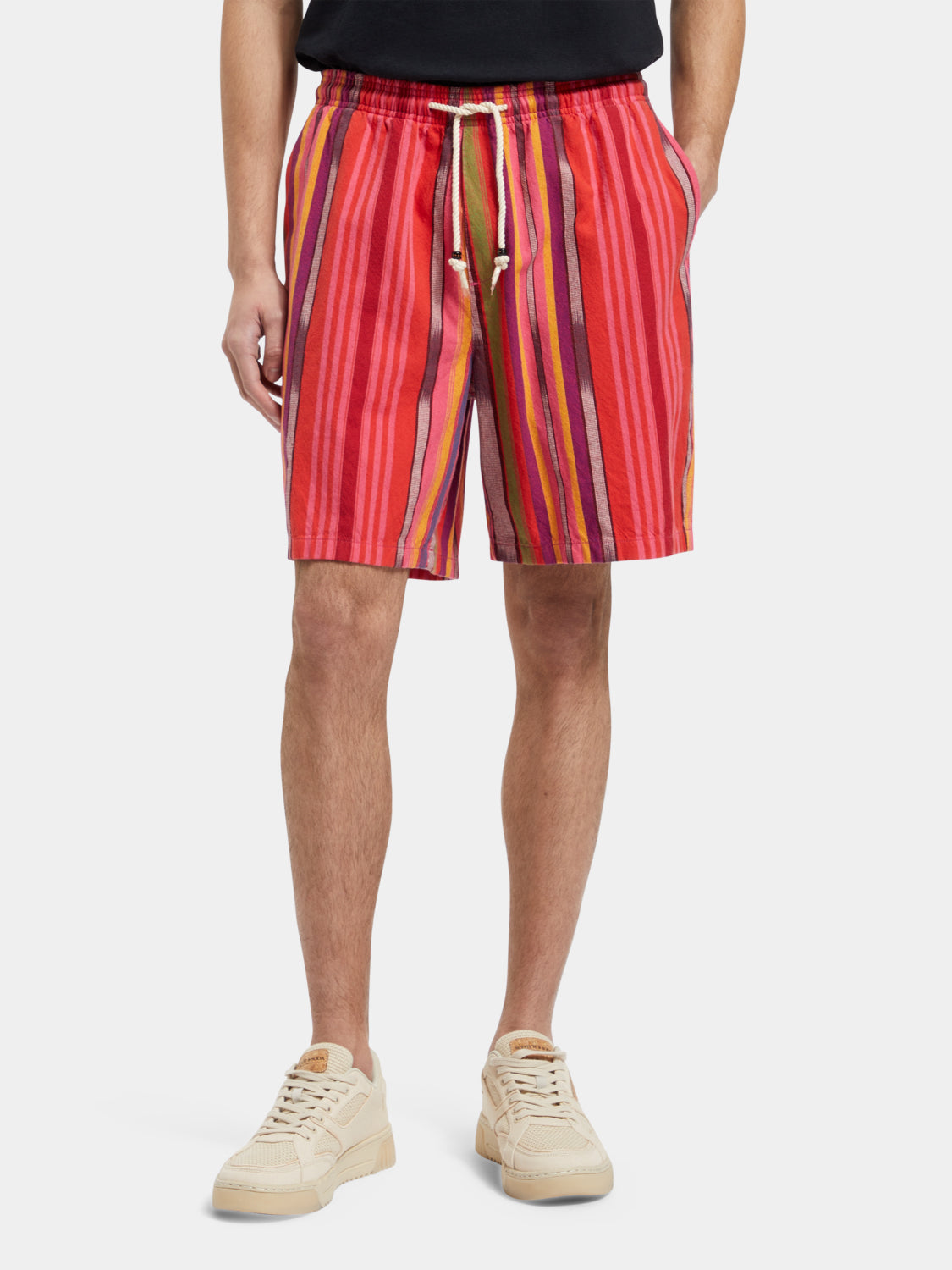 Striped Oxford shorts by Scotch & Soda featuring a classic pattern and tailored fit, shown on a model.