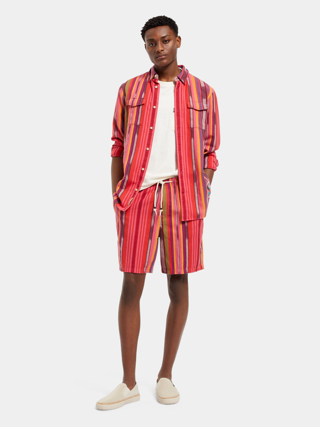 Striped Oxford shorts by SCOTCH & SODA featuring a casual fit and classic pattern, displayed on a neutral background.