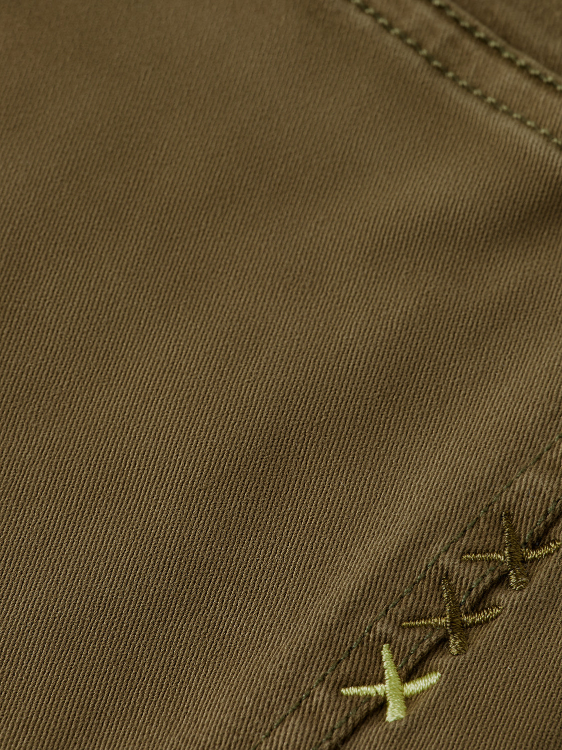 Slim fit Ralston pants by Scotch & Soda, shown in dark denim fabric with classic five-pocket design.