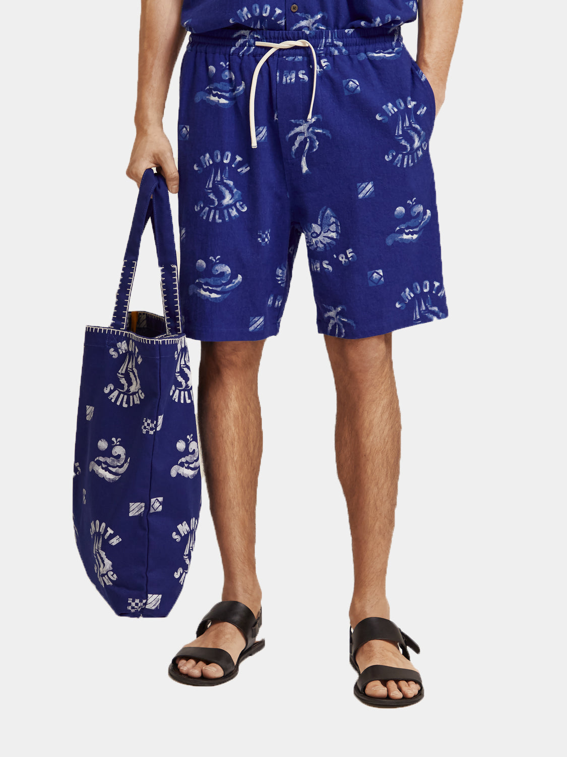 Scotch & Soda Fave printed shorts with colorful floral pattern and relaxed fit, shown from the back.