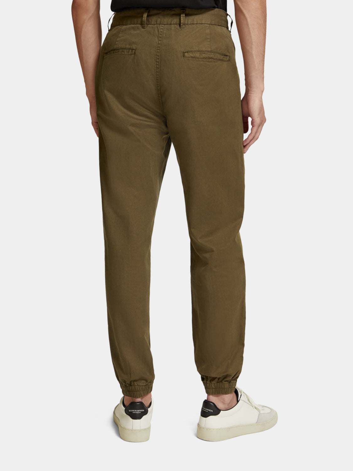 Scotch & Soda linen blend chino jogger pants in taupe with relaxed fit and elastic waistband, front and back view.