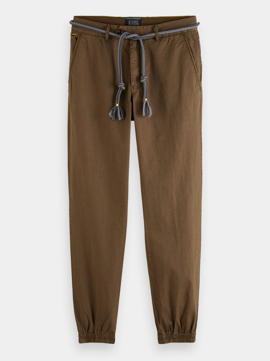 Linen blend chino joggers by Scotch & Soda, light-colored pants with a relaxed fit and casual style, front view.