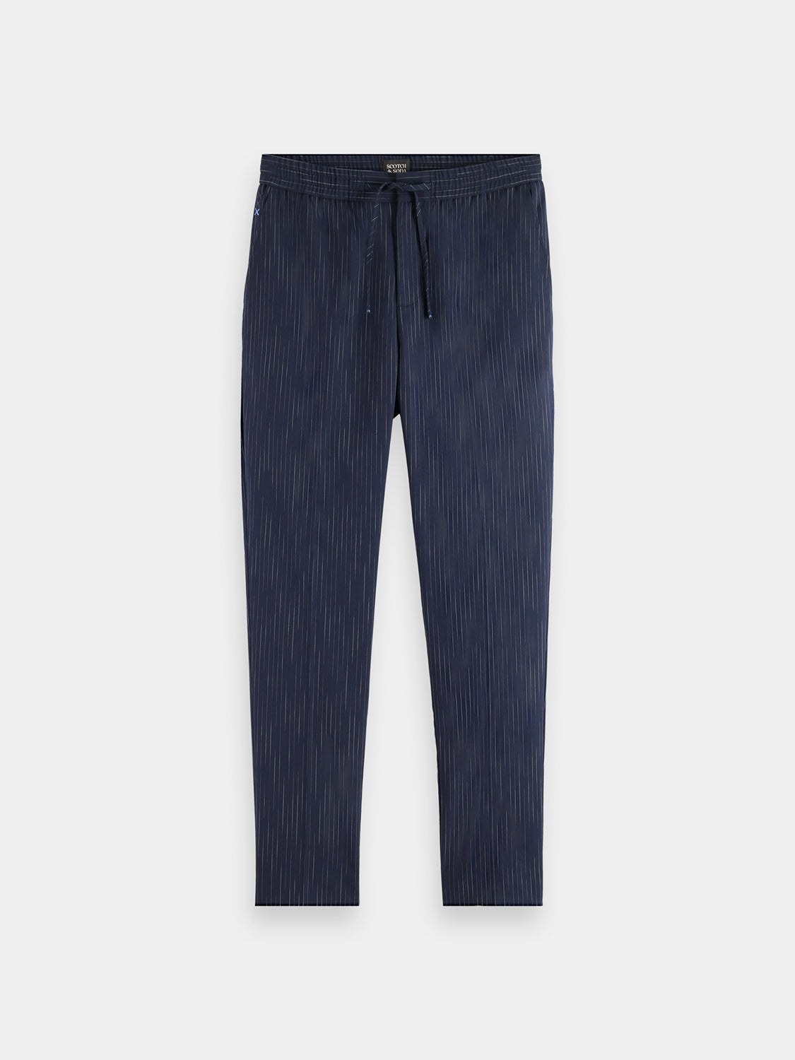 Slim fit Finch tapered pants by Scotch & Soda, featuring a modern tapered design and classic style in neutral fabric.