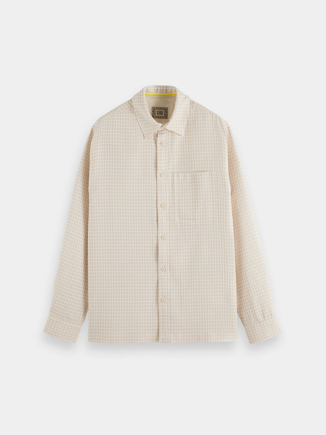 Long sleeve Scotch & Soda dobby check shirt with a classic pattern, shown on a model.