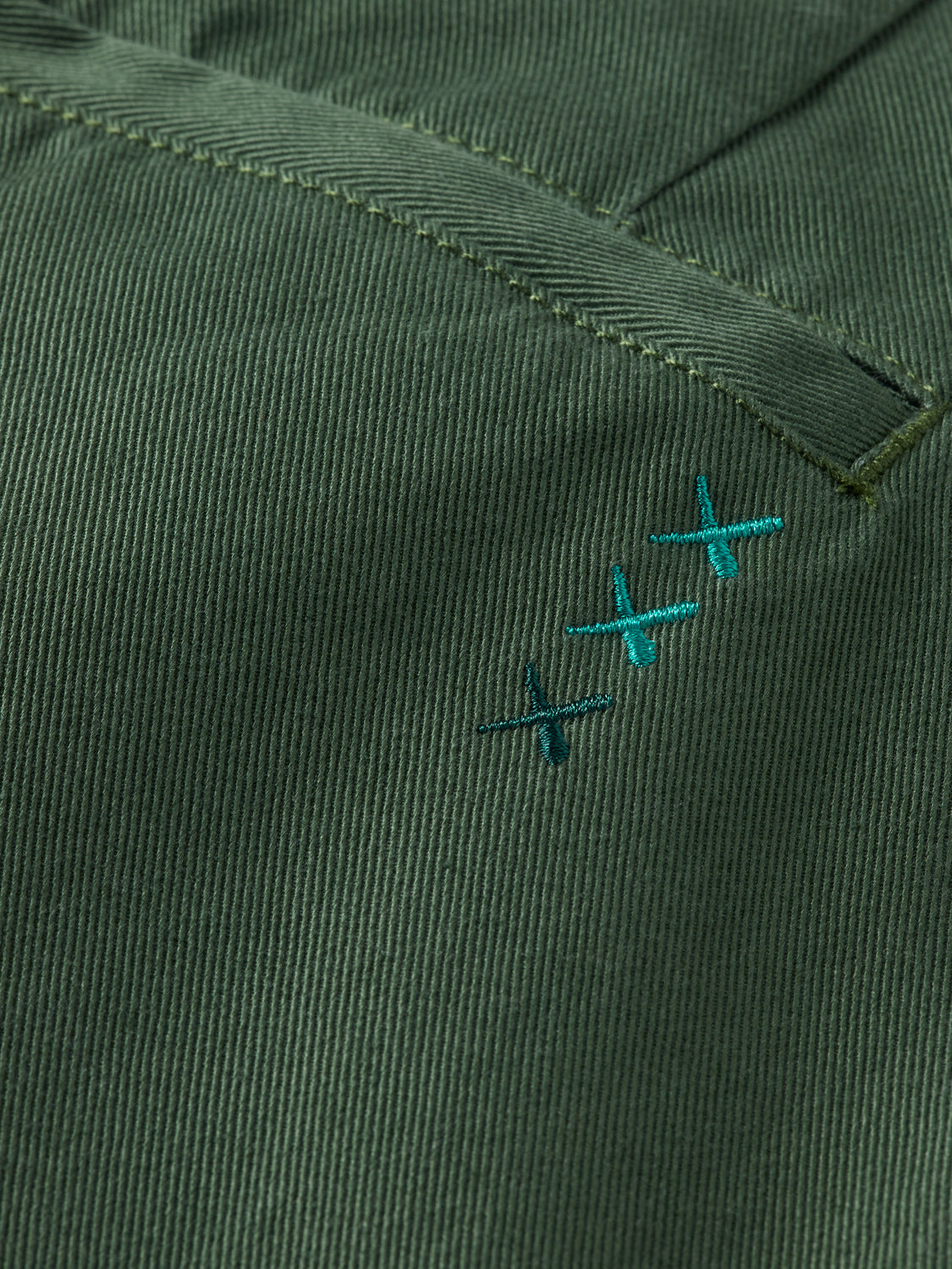 Straight fit twill chinos pants by Scotch & Soda, featuring a classic design and neutral color, shown on a model.