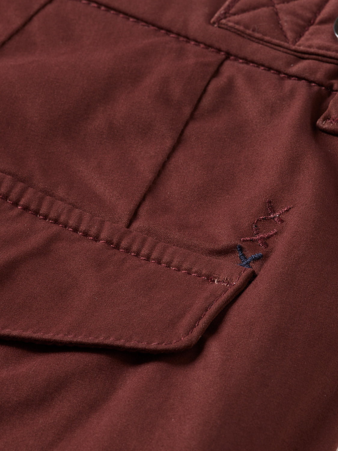 Scotch & Soda Blake slim fit chinos in a neutral color, displayed on a hanger, showcasing the stylish men's pants.