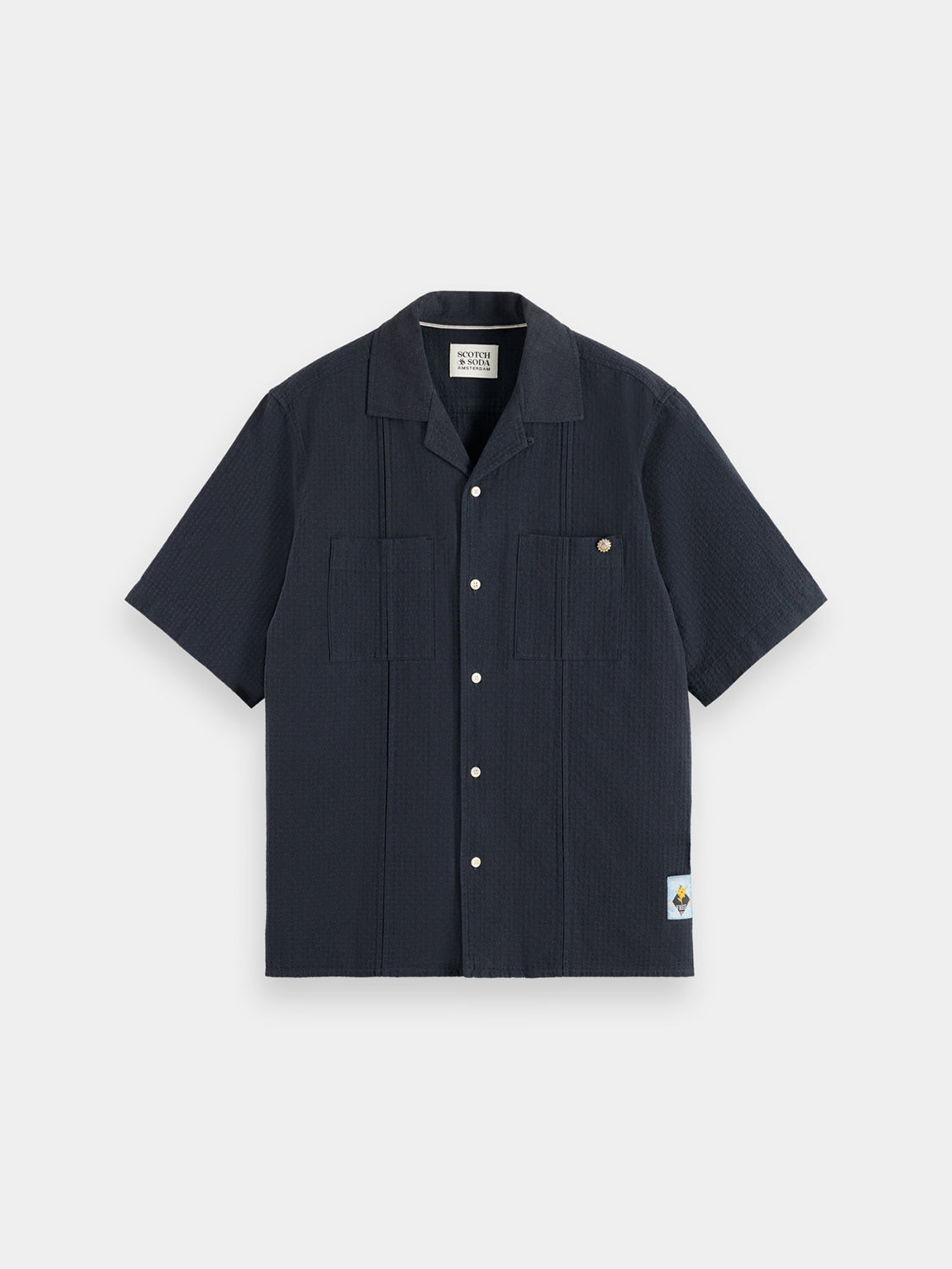 Light blue Scotch & Soda structured dobby shirt with short sleeves and textured fabric for a stylish summer look.