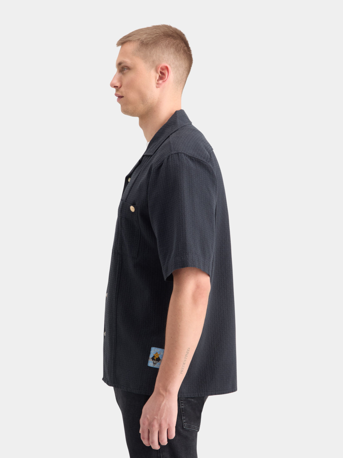 Light blue Scotch & Soda structured dobby shirt with short sleeves, button front, and textured fabric for a stylish casual look.