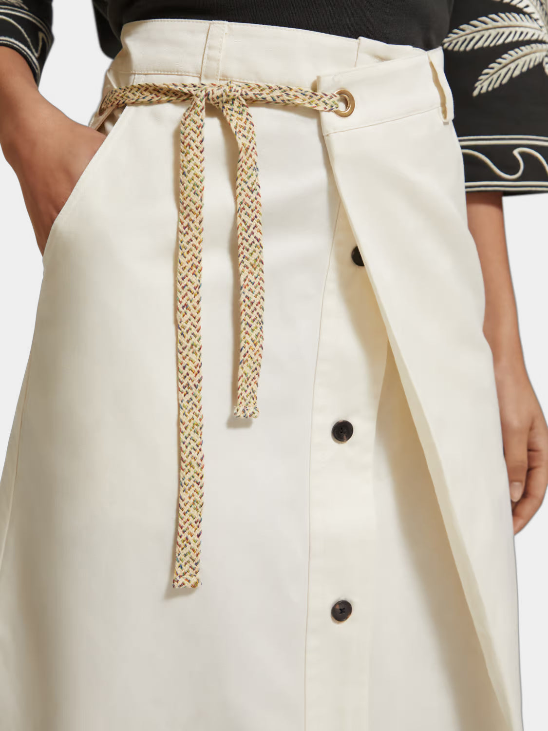 Scotch & Soda wrap front midi skirt in flowing fabric with a fitted waist and elegant design.