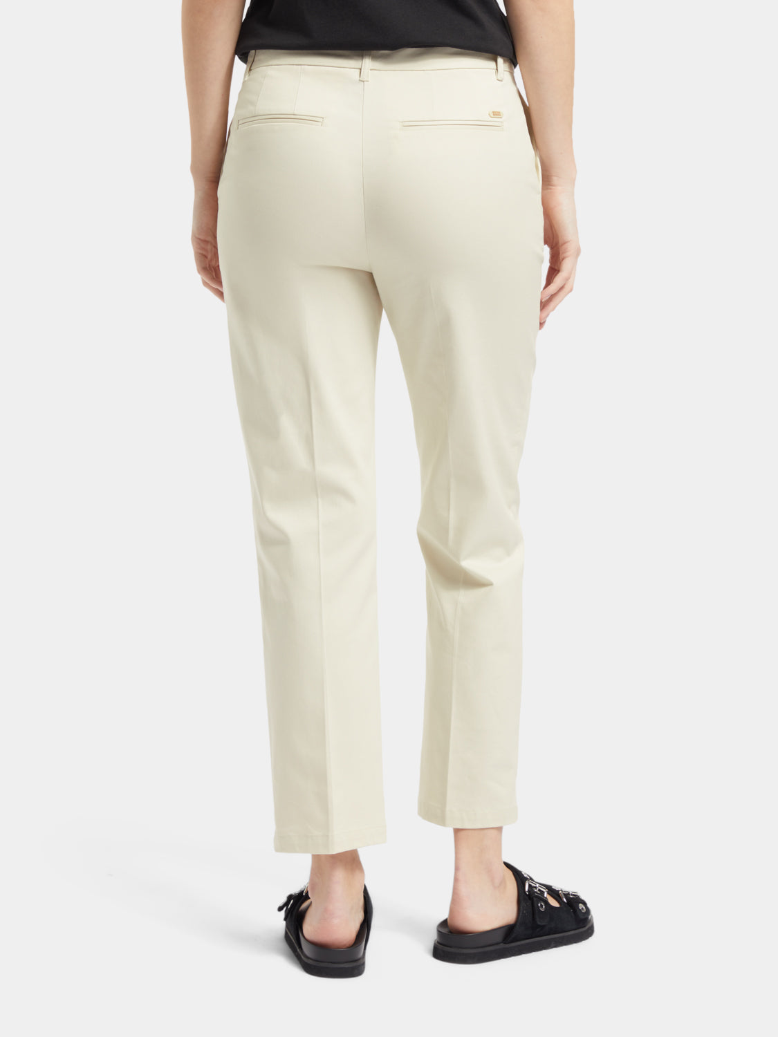 Scotch & Soda Abott tapered chinos pants in a neutral color, showing the back view with tailored fit and subtle stitching details.