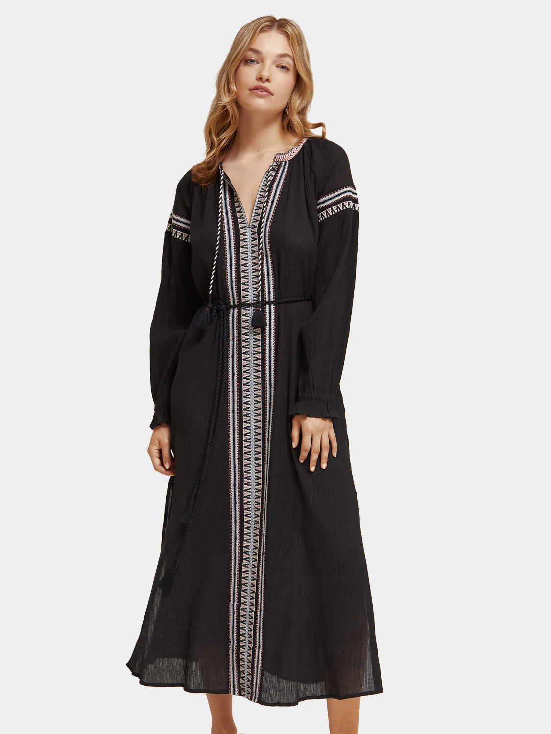 SCOTCH & SODA midi dress with intricate embroidery, featuring a flowing silhouette and detailed needlework on the fabric.