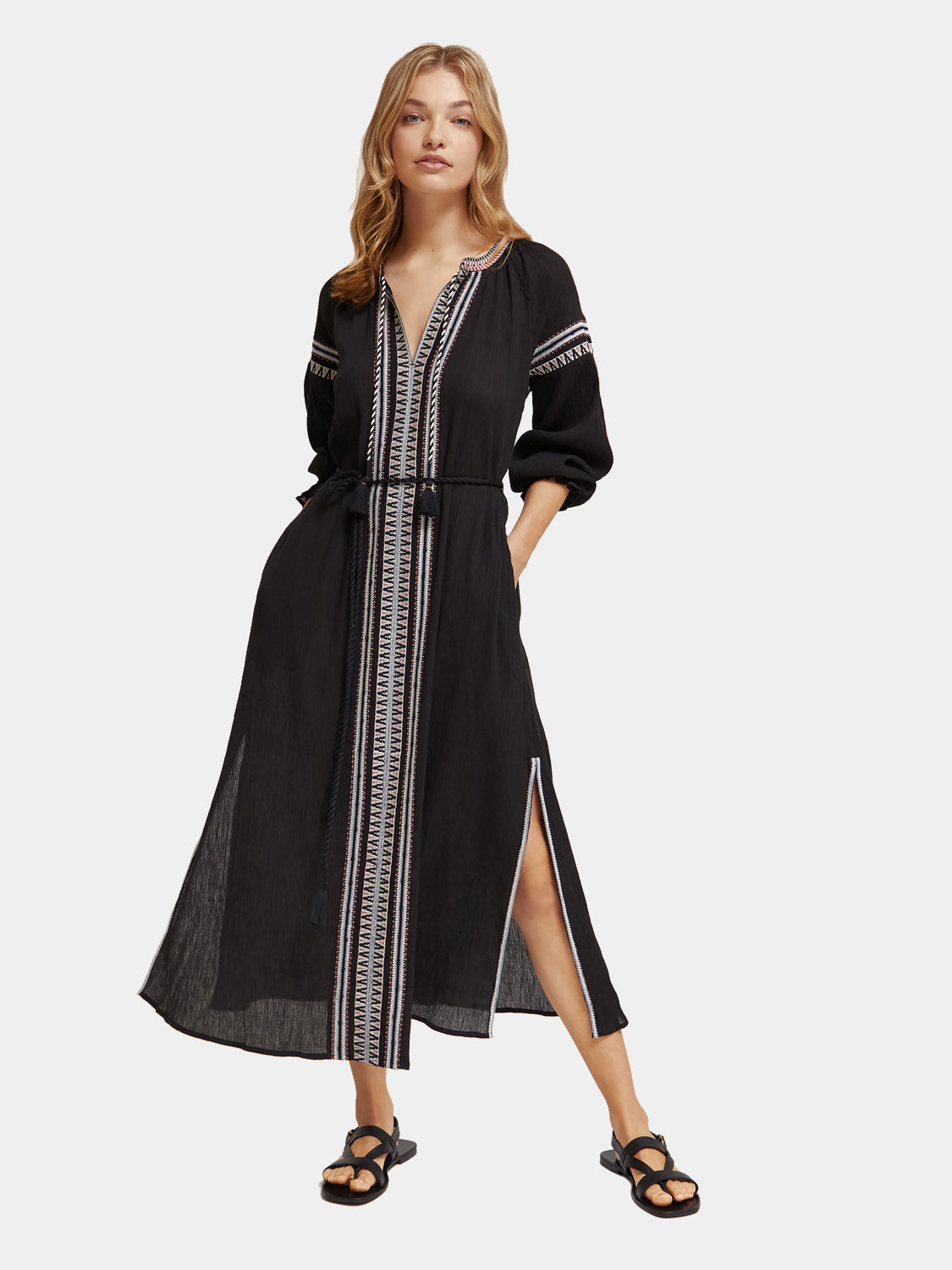 Scotch & Soda midi dress with intricate embroidery, showcasing a stylish and elegant design on a flowing fabric.