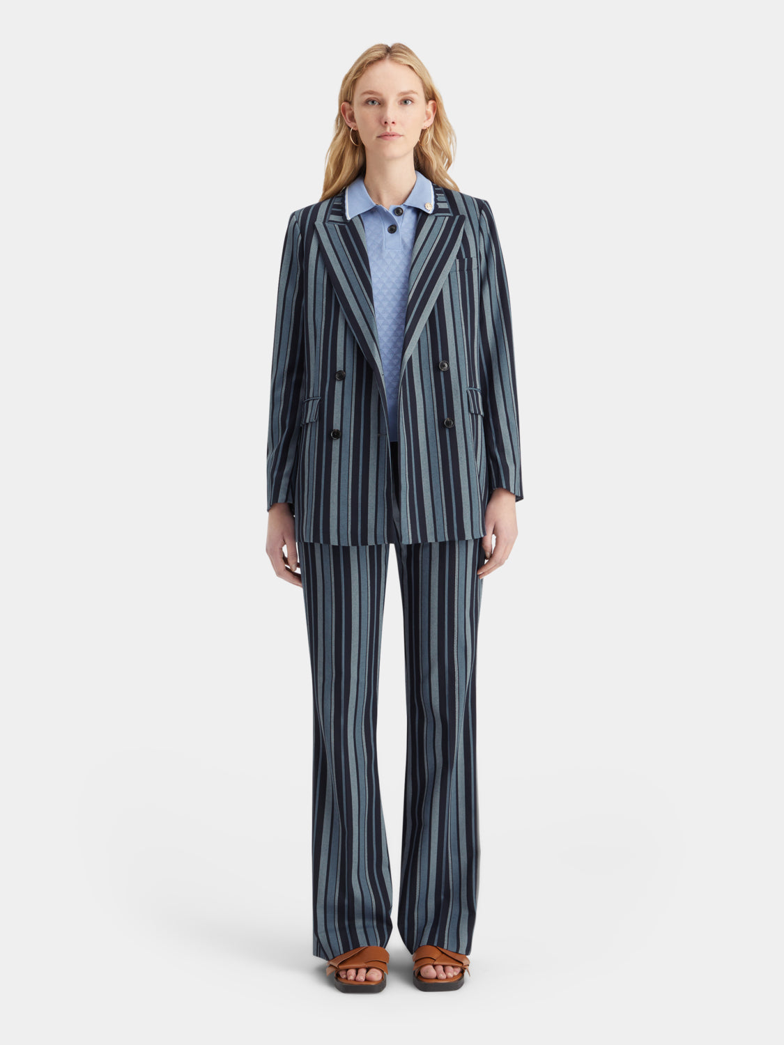 Violet Scotch & Soda kick flare pants with high waist and wide leg, styled with casual top and accessories on model.