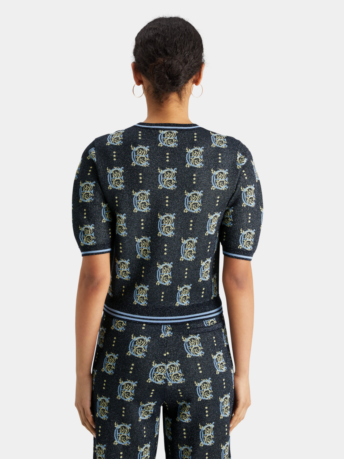 Gray Jacquard knit cropped top by SCOTCH & SODA, featuring intricate woven patterns and a fitted style.