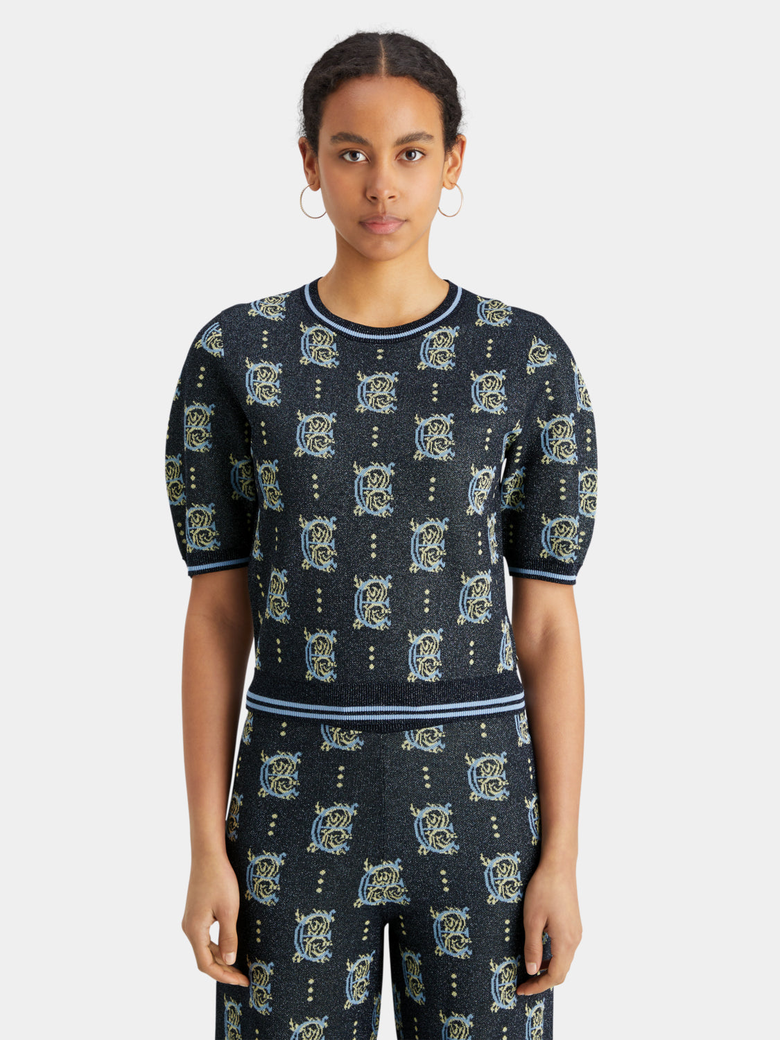Scarlet knit Jacquard cropped top by Scotch & Soda featuring intricate patterns and a fitted style.