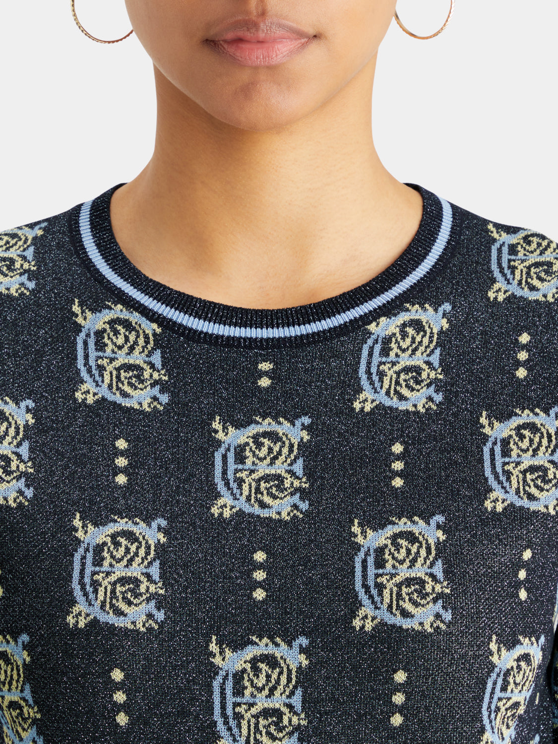 Jacquard knit cropped top by Scotch & Soda featuring intricate pattern and fitted design, shown on a model.