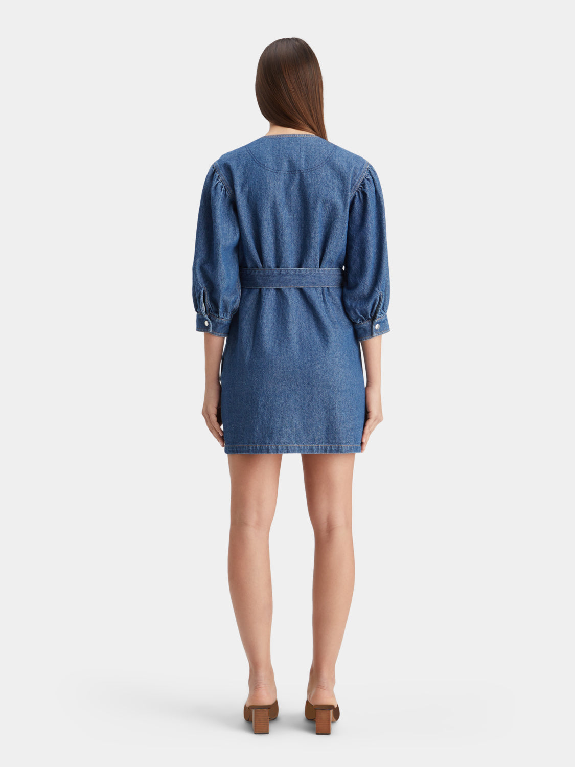 Scotch & Soda belted v-neck denim dress displayed on a model, featuring a casual fit with a waist belt and short sleeves.