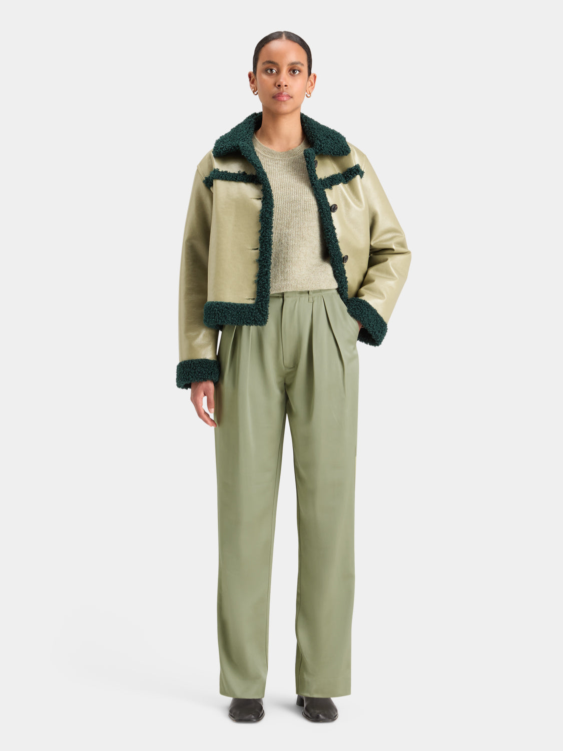 Scotch & Soda Faye tapered pants in neutral fabric, featuring a tailored fit and clean design, suitable for casual or office wear.