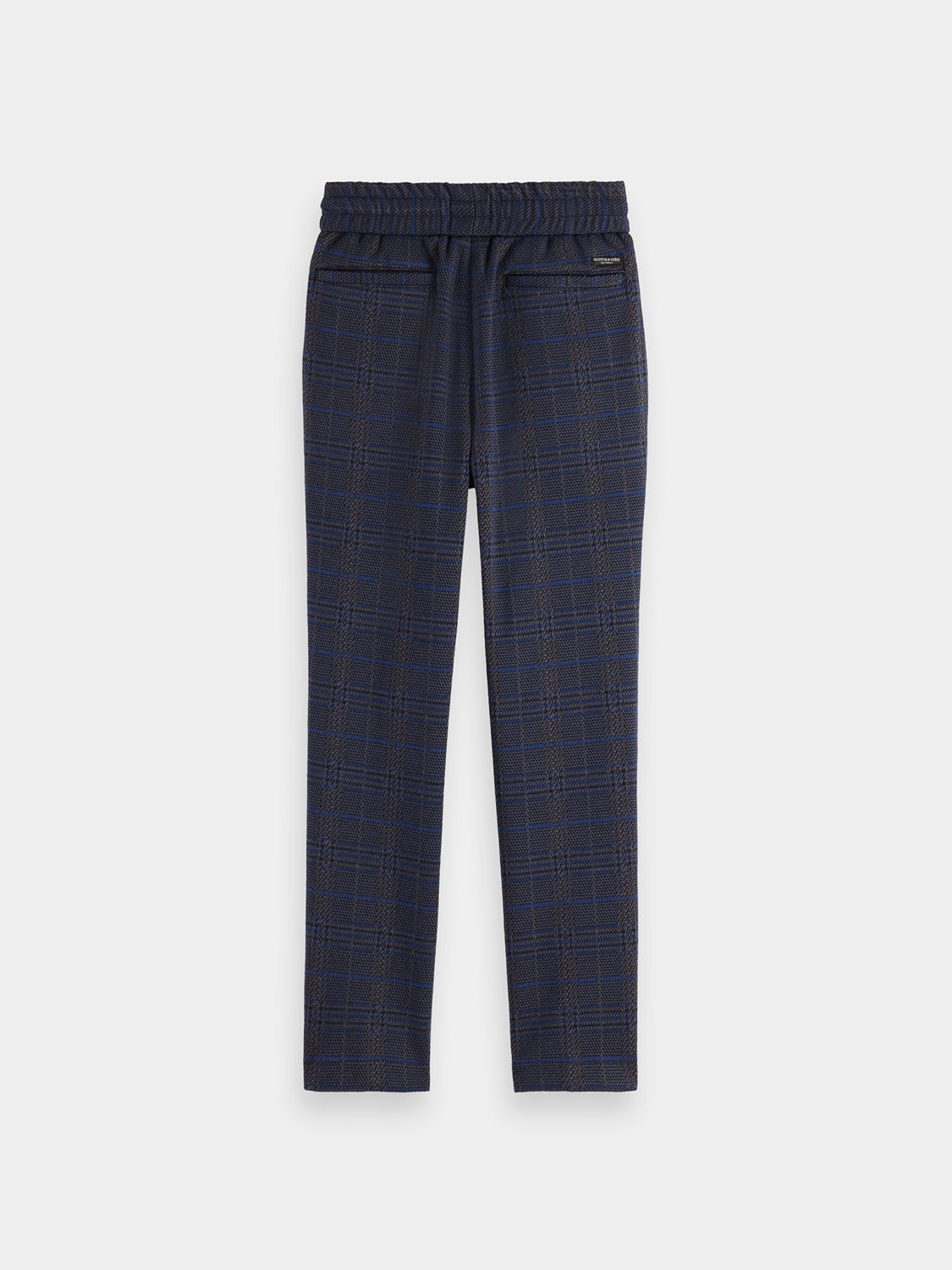 Kids yarn-dyed pants by Scotch & Soda, showing the back view with colorful woven fabric and comfortable fit.