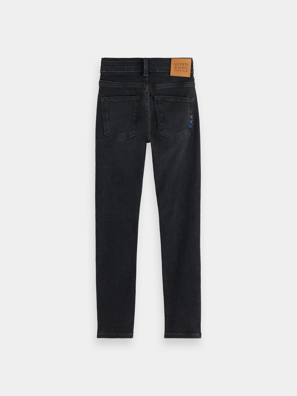 Kids' Tigger skinny fit denim jeans by Scotch & Soda, showing the dark blue denim fabric and classic five-pocket design.