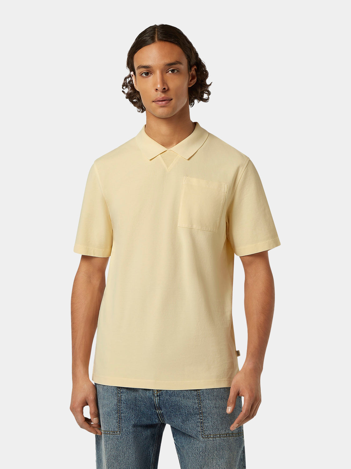 Scotch & Soda garment-dyed polo shirt in a rich color, close-up of soft fabric and classic collar design.