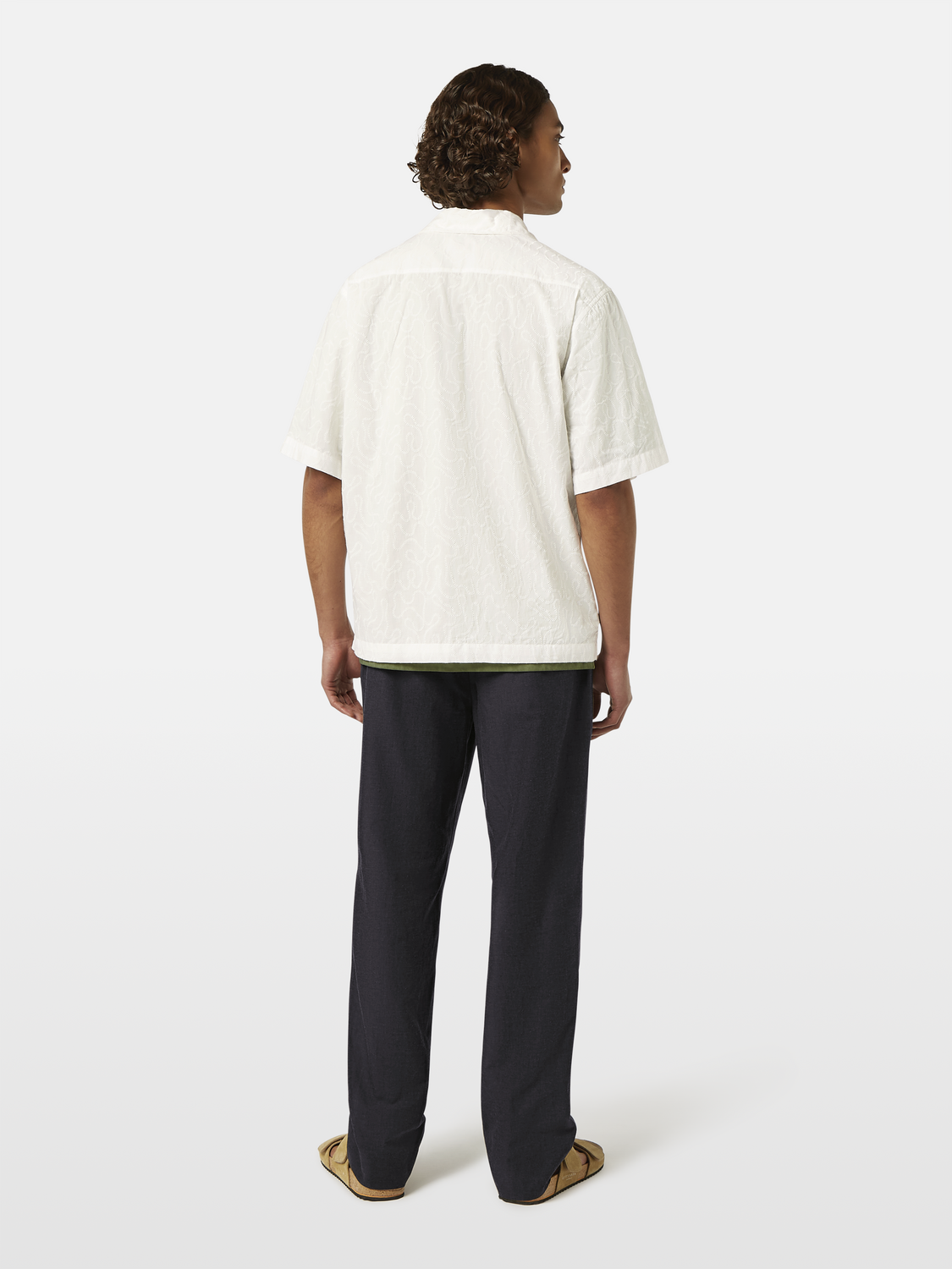 Embroidered short-sleeve shirt by Scotch & Soda with floral patterns, lightweight fabric, and button-front design.