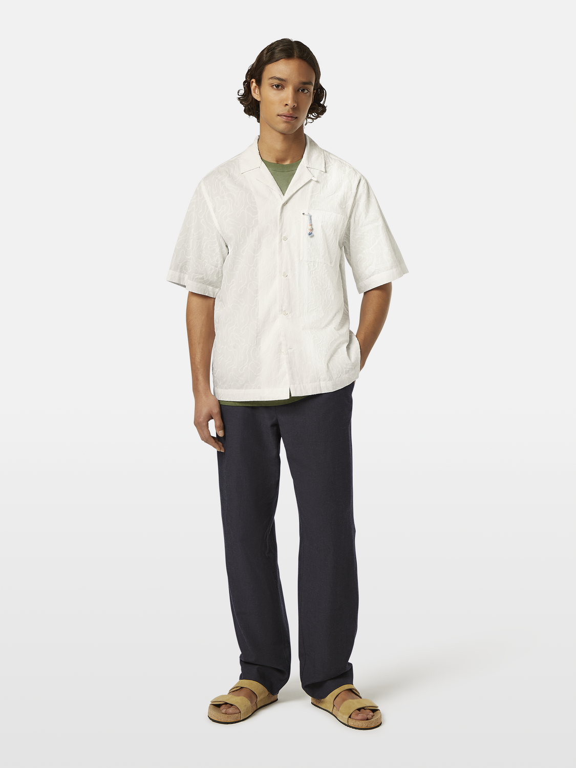 Embroidered short-sleeve shirt by Scotch & Soda featuring colorful floral embroidery on lightweight fabric.
