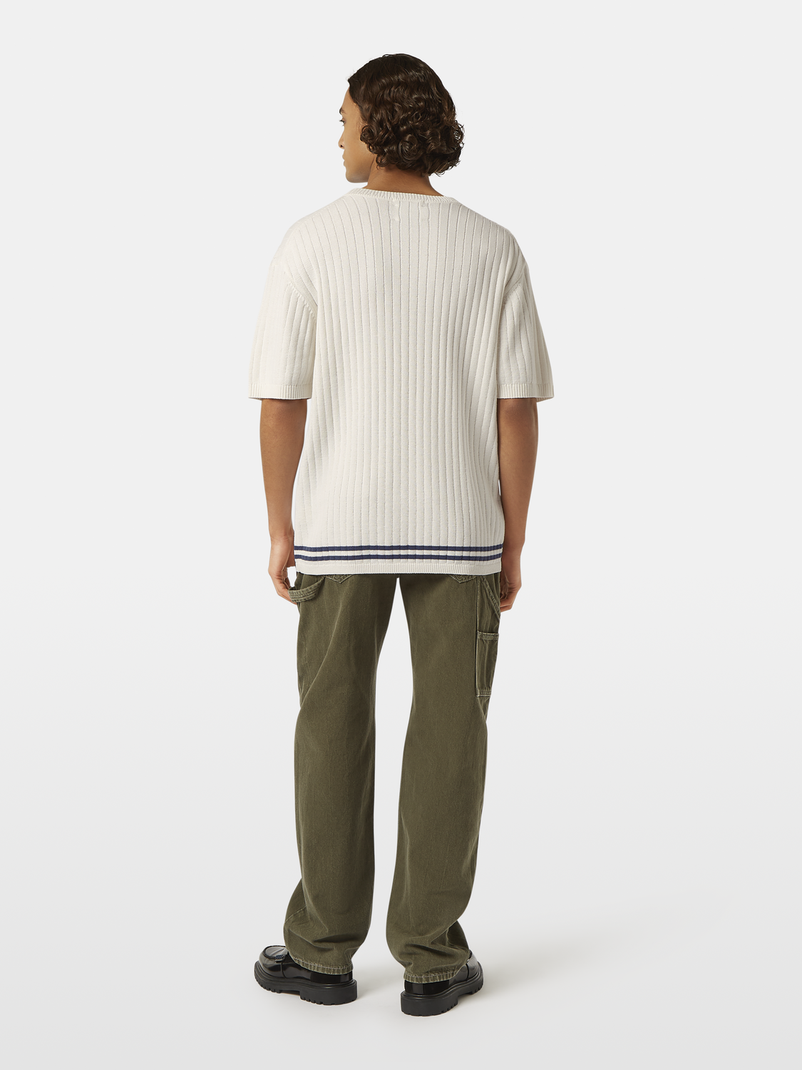 Structured knitted T-shirt from Scotch & Soda, showing a close-up of the textured knit fabric and classic fit.