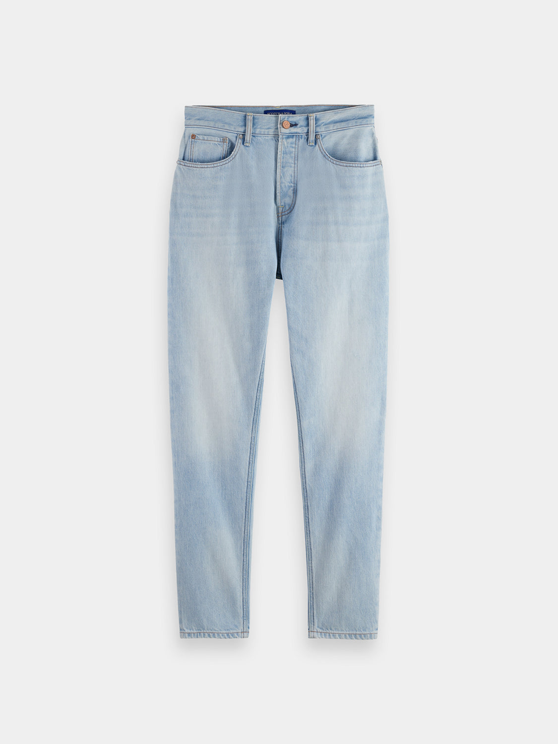 SCOTCH & SODA Dean tapered denim jeans shown in classic blue with a slim fit and rolled cuffs.