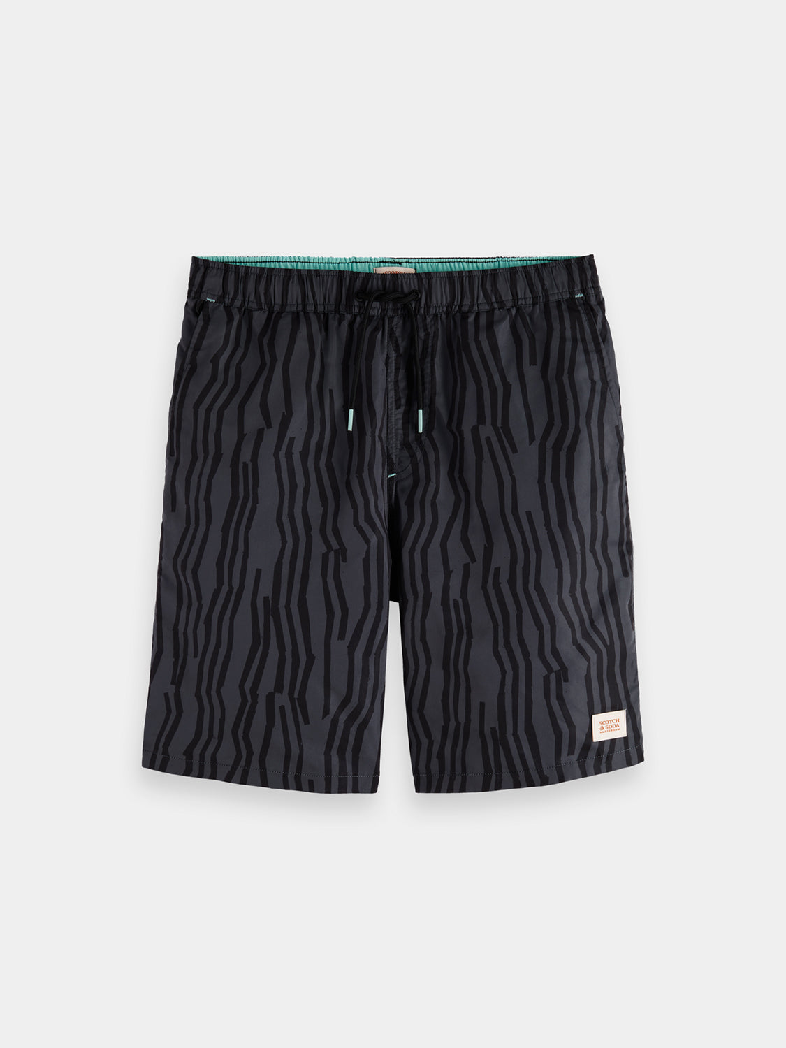 Printed swimshorts from SCOTCH & SODA with vibrant tropical pattern, lightweight fabric, and elastic waistband.