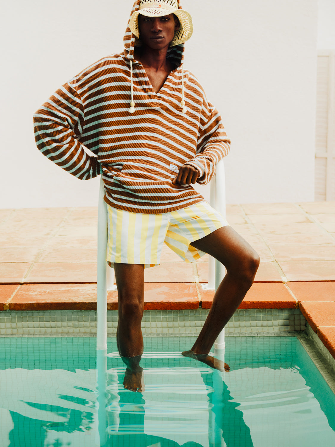 Striped terry hoodie from Scotch & Soda, a casual sweat featuring colorful horizontal stripes and a relaxed fit.