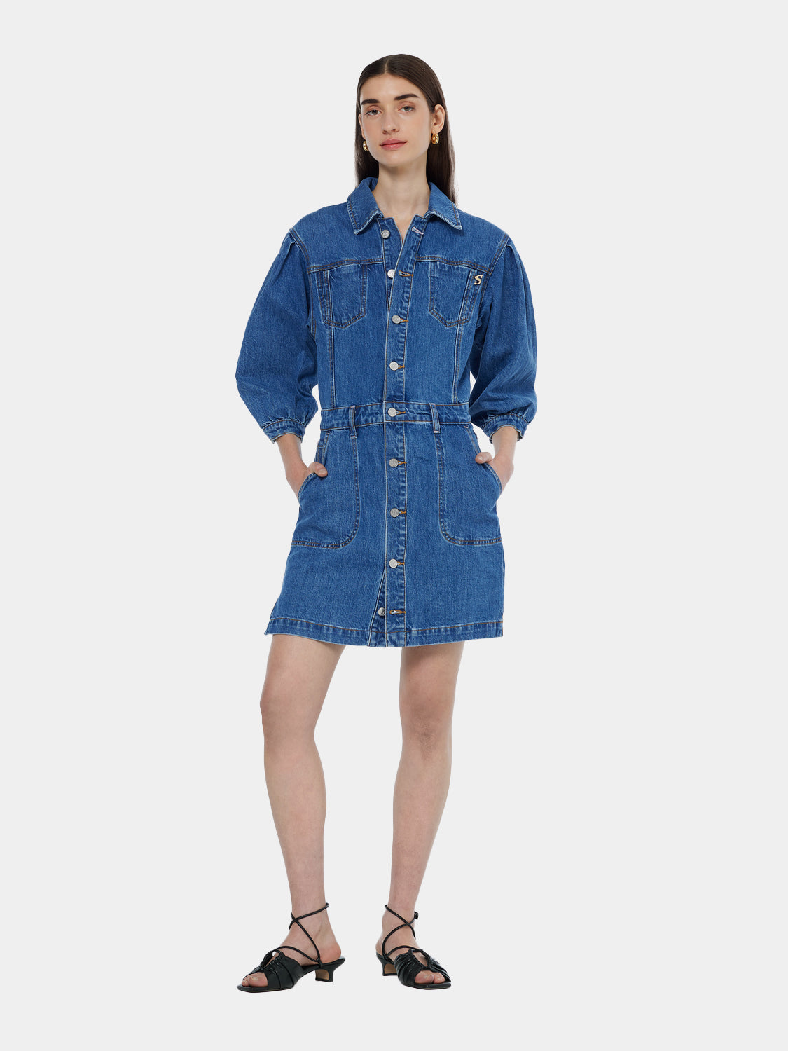 Blue denim dress from Scotch & Soda with short sleeves and a casual fit, displayed hanging on a wooden hanger.
