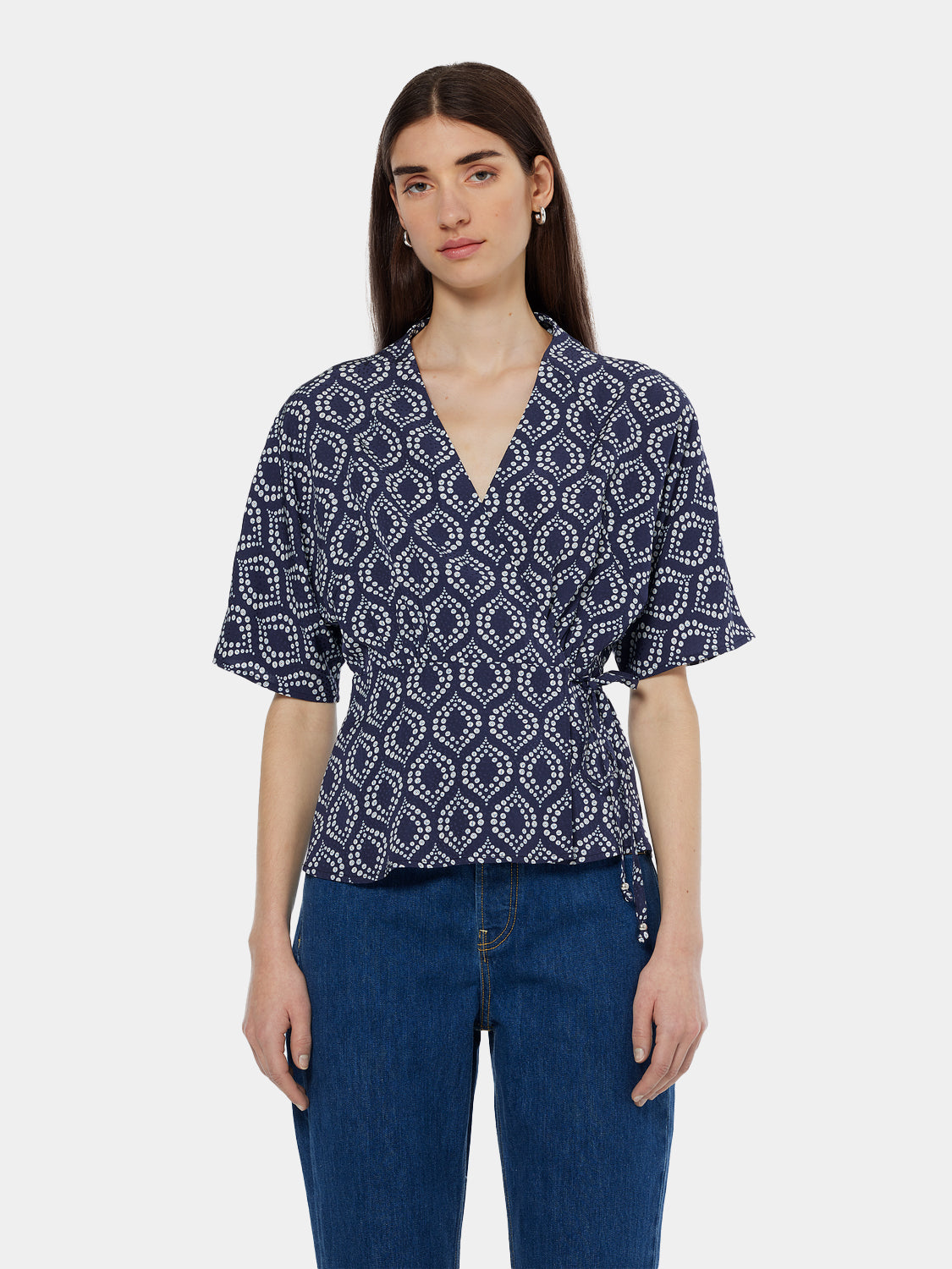 Woven wrap top by Scotch & Soda featuring a stylish design and comfortable fit, shown on a model.