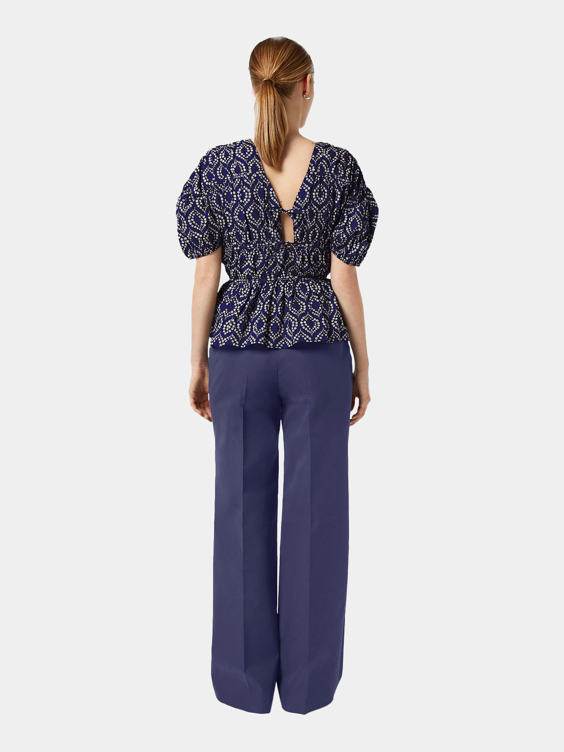 Black Scotch & Soda woven top with gathered balloon sleeves and a relaxed fit, displayed on a model.