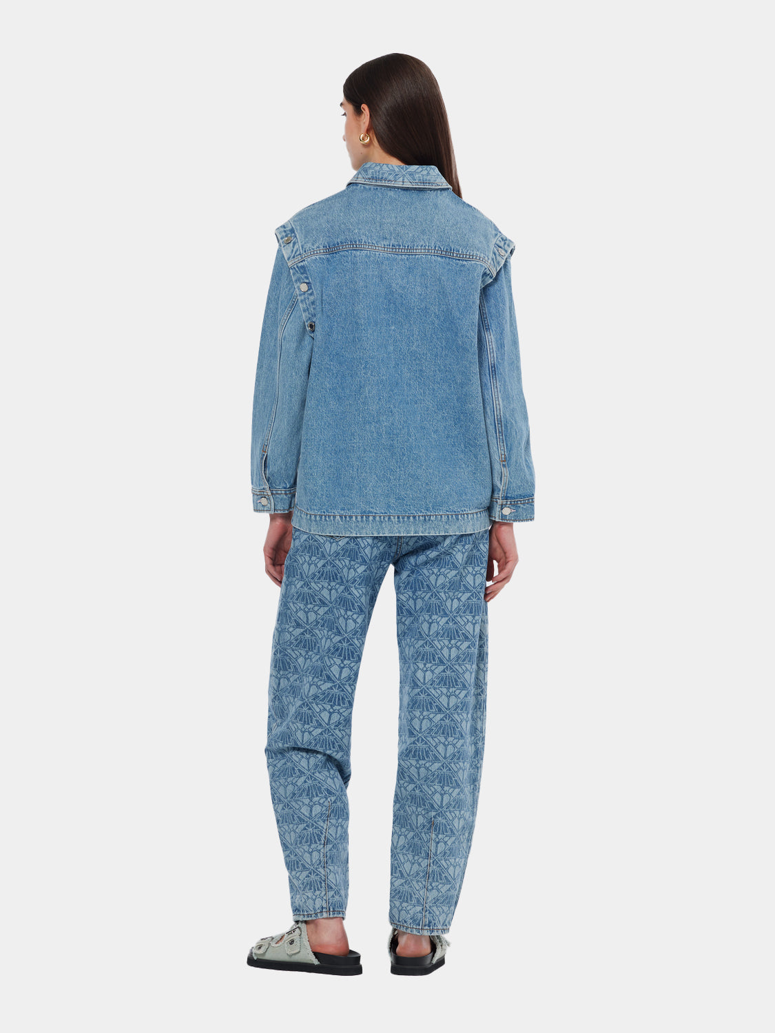 Scotch & Soda washed denim jacket with classic fit, featuring button front and chest pockets, styled for casual wear.