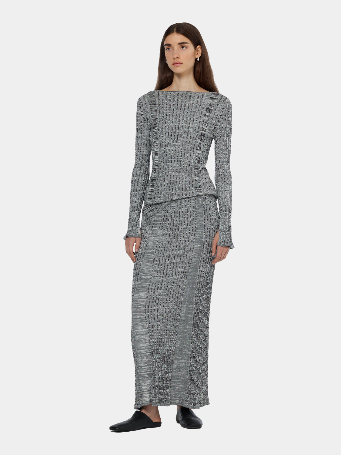 Ribbed knitted maxi skirt by Scotch & Soda, featuring a fitted waist and flowing length in a neutral color.