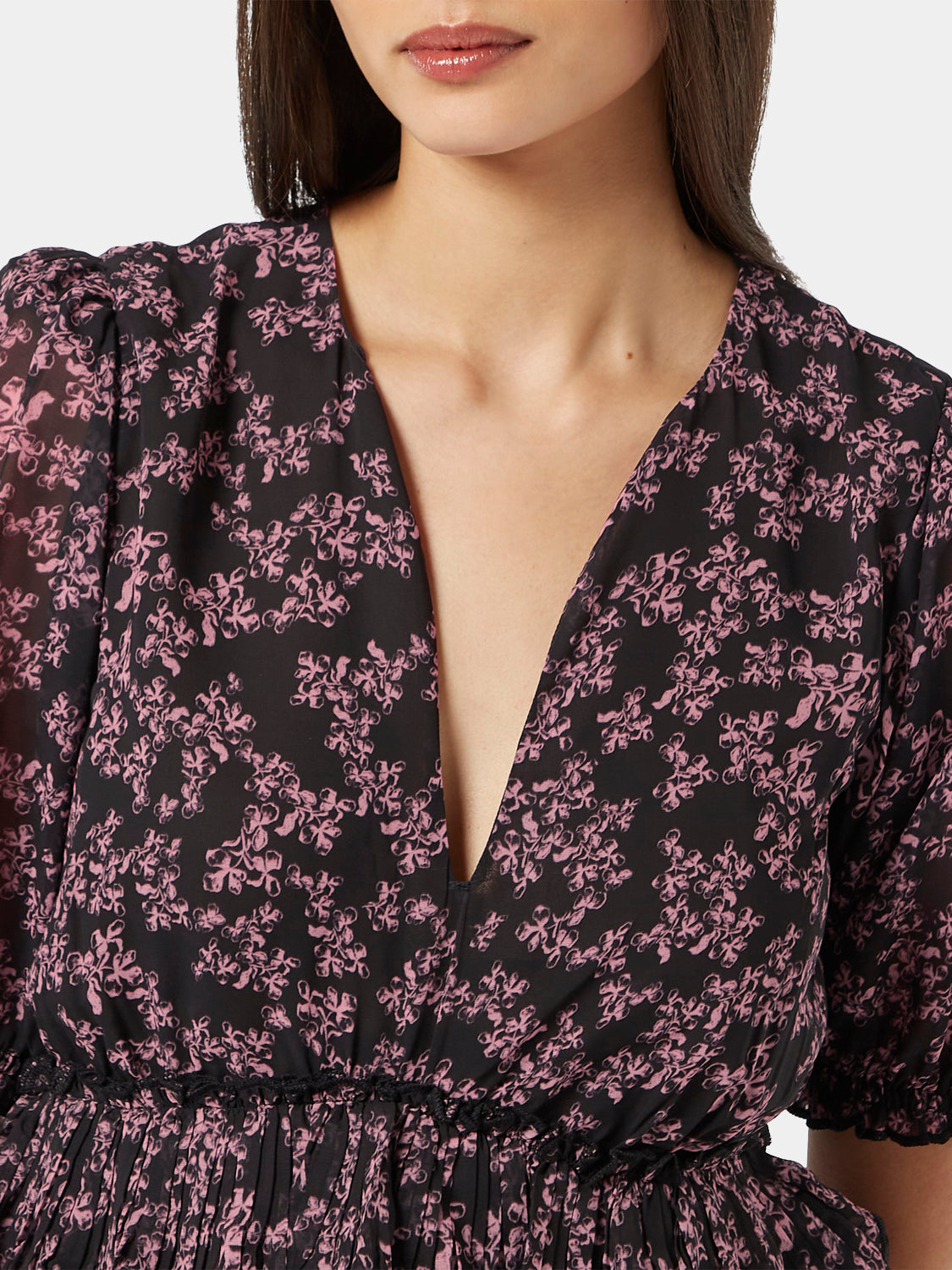 Scotch & Soda pleated mini dress in vibrant fabric, featuring a stylish silhouette and detailed pleats, perfect for casual or semi-formal wear.