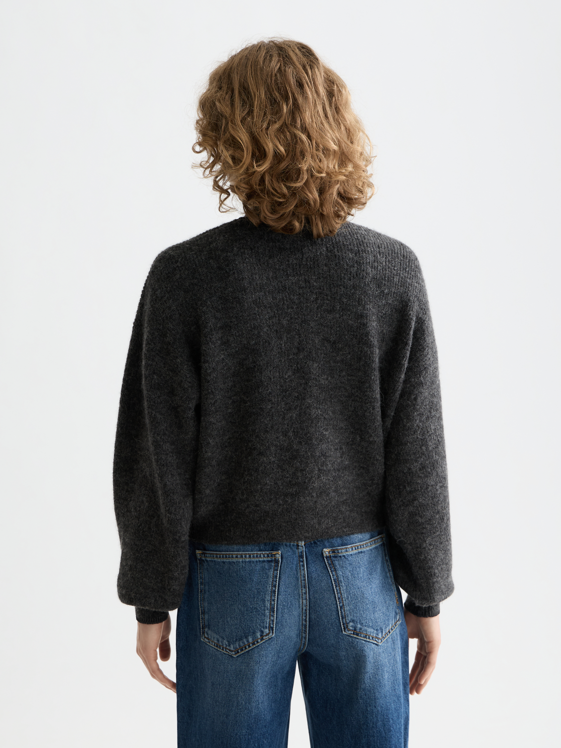 Fuzzy knit cardigan by Scotch & Soda featuring a cozy, textured fabric and a relaxed fit, shown from the back view.