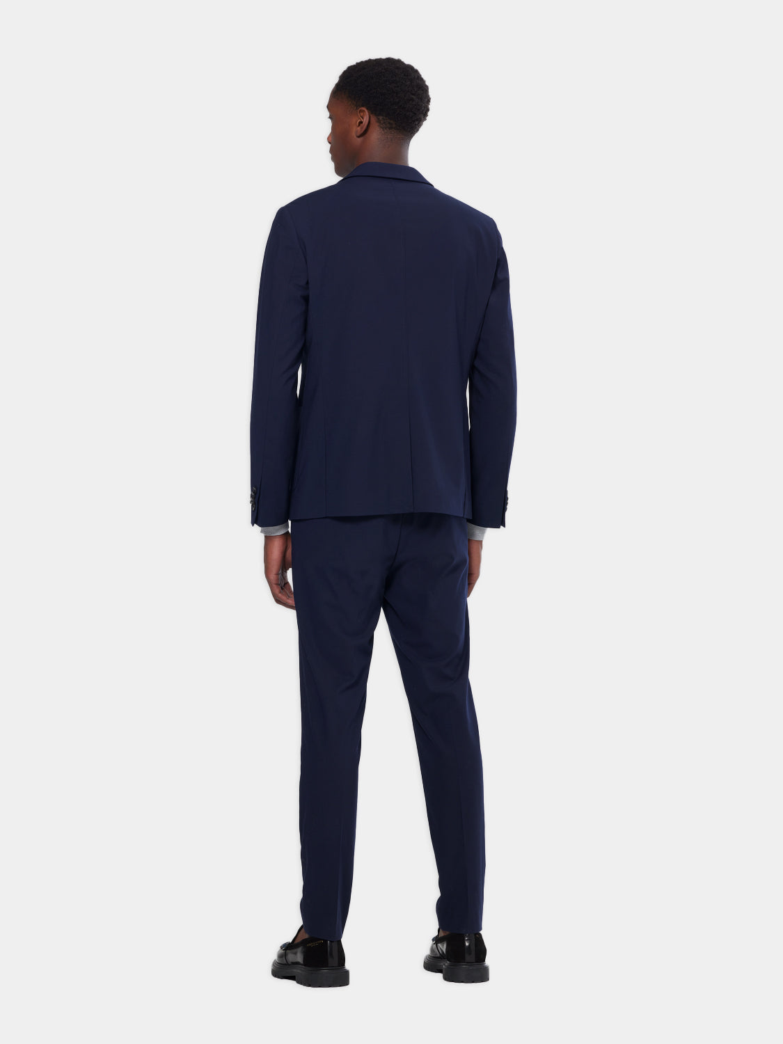 SCOTCH & SODA men's navy peak lapel blazer, tailored fit, with front buttons and structured shoulders.