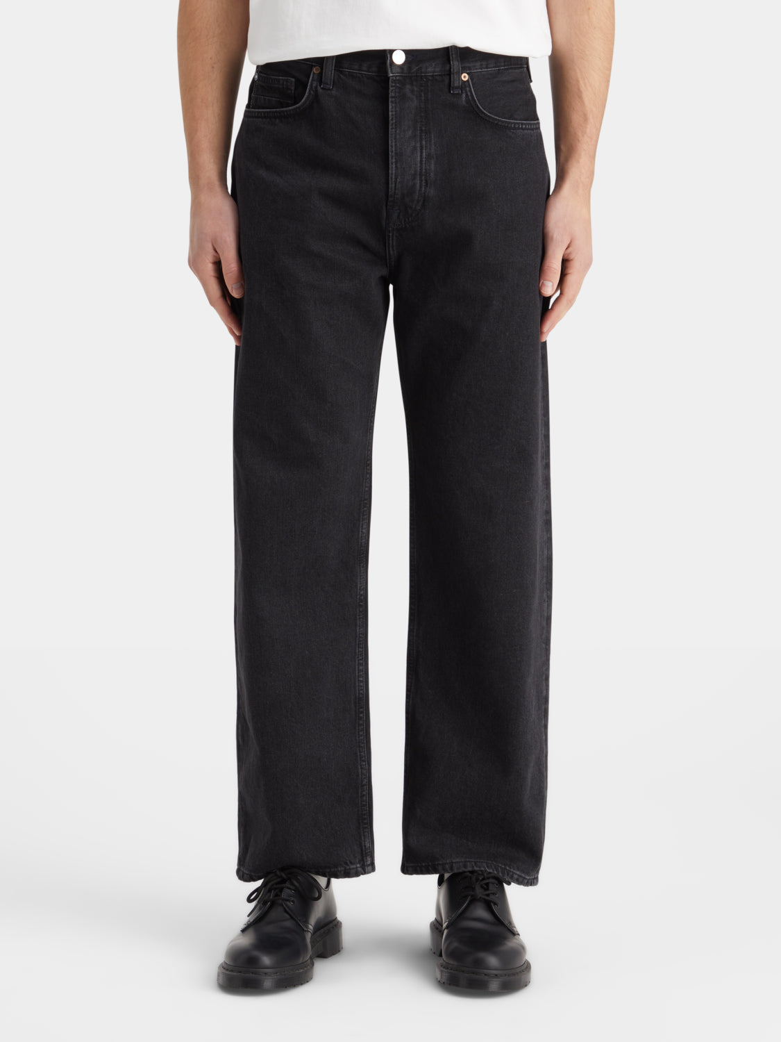 Scotch & Soda loose-fit denim jeans featuring a relaxed style, classic five-pocket design, and light wash finish.